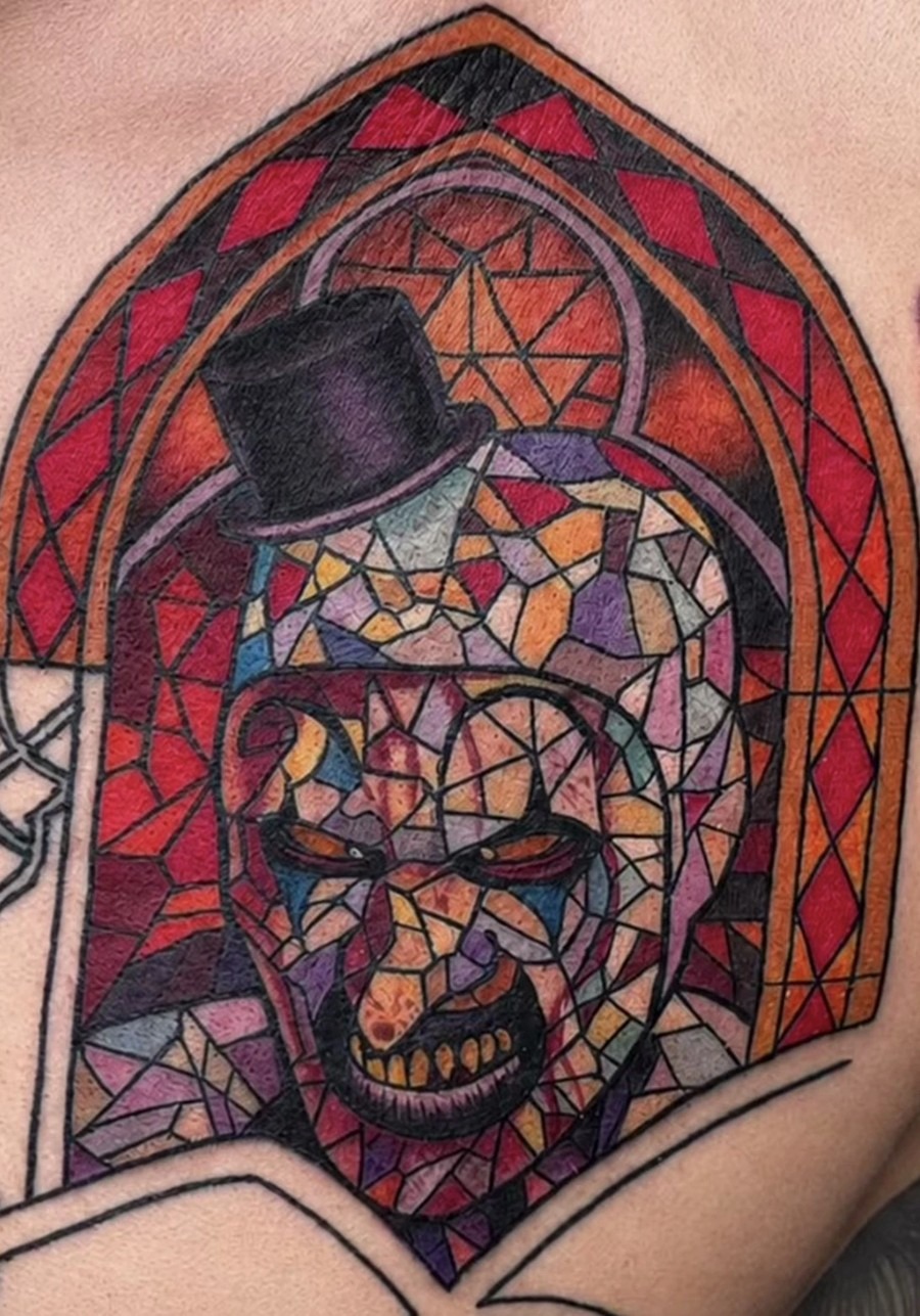 Gothic stained-glass skull tattoo in color