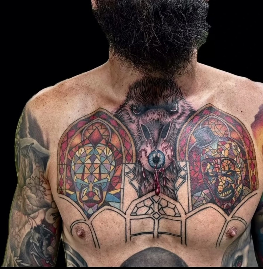 Raven chest tattoo